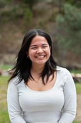 young woman in front of green background