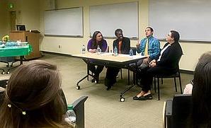 Participants of the spring equity workshop in discussion with eachother.